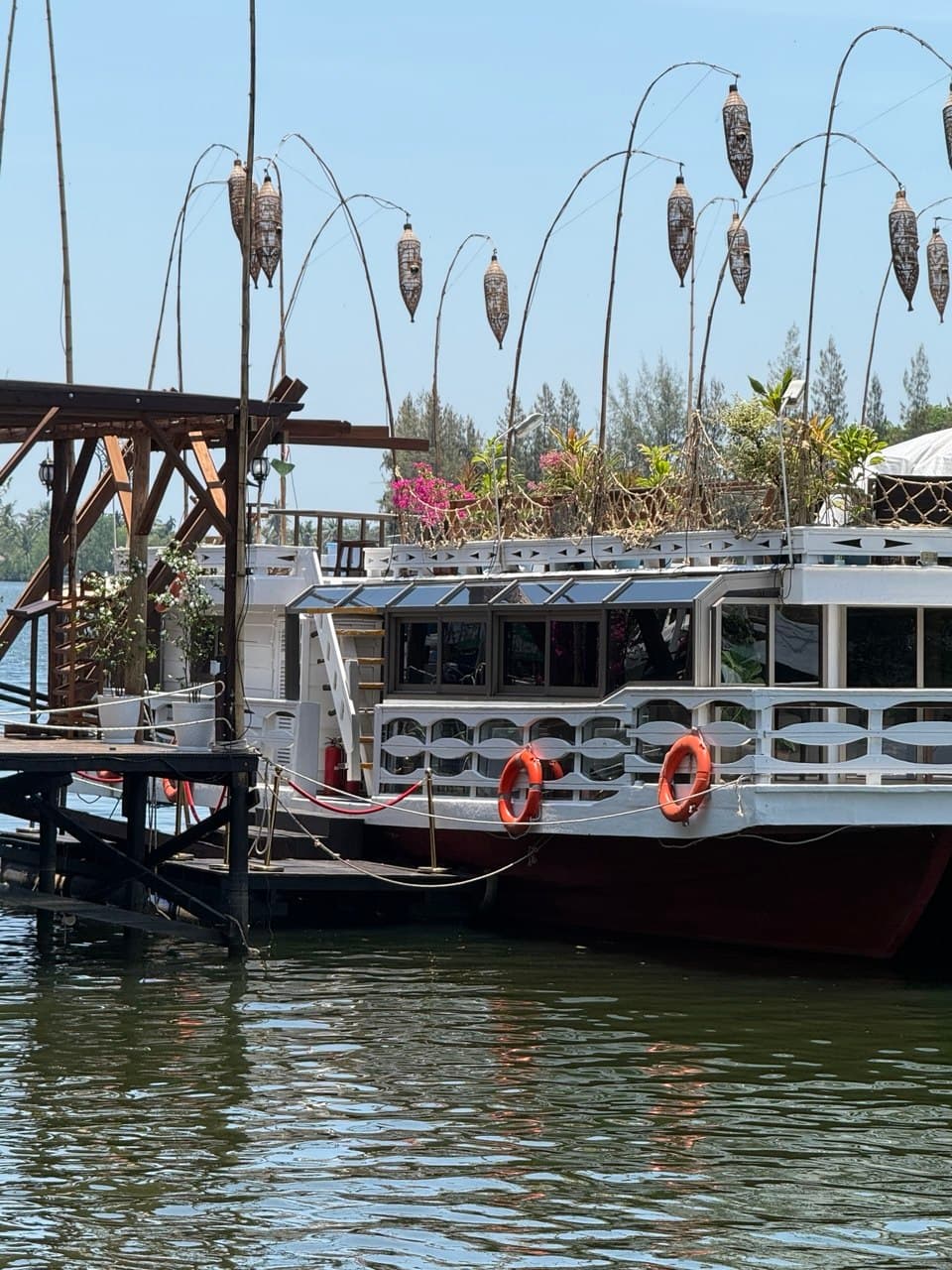 Riverboat with lantern poles in Kampot
